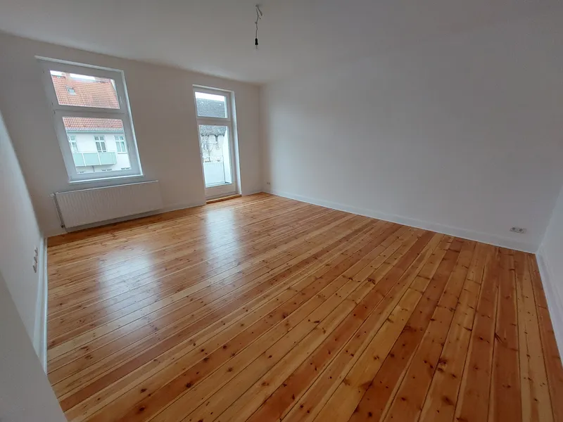 Wohnen über den Dächern Wedding! Modernisierte Wohnung mit Einbauküche und Dielenfußboden! — photo 1